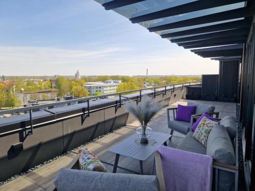 Tartu Apartment | Exceptional Artisa Riia Str 20a Penthouse with Child-Friendly Amenities