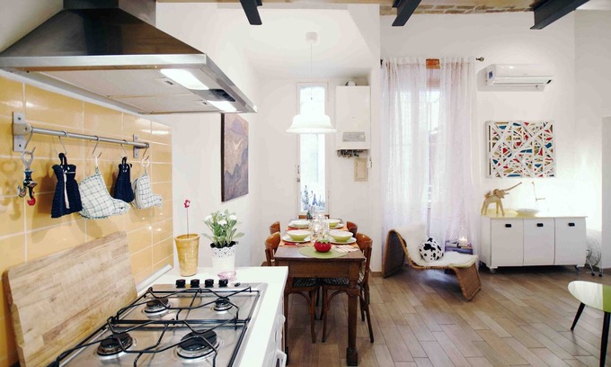 Esquilino Apartment | Artist's House: Steps from Colosseum with Family Amenities