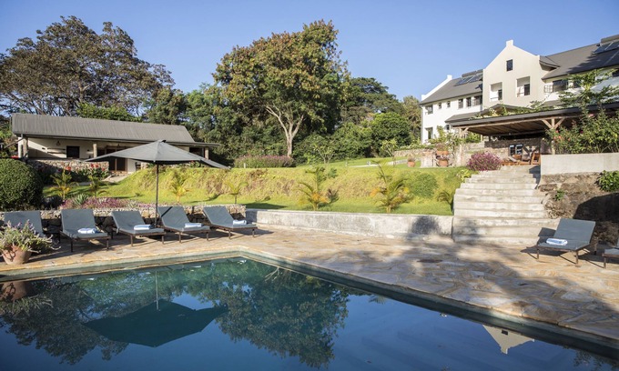 Arusha Hotel | Discover Arusha Villa: Perfect for Families with Pool & Dining