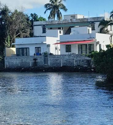 Grand River South East Apartment | Serene Ashan Seafront Villa: Family & Pet-Friendly Retreat