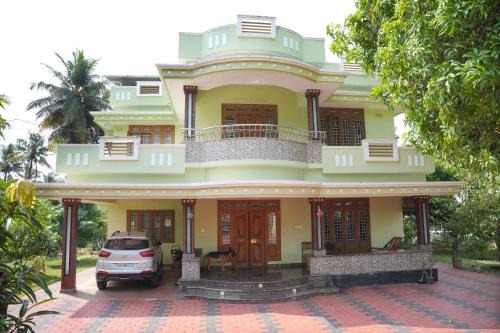 Thrissur House | Comfortable Ashiaana Homestay: Family & Pet Friendly Retreat