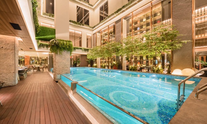Kampung Bali Hotel | Discover Ashley Tanah Abang: 4-Star Stay with Pool & Dining