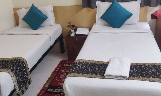Krishnarajapura Hotel | Discover Aster Vue Hotel: Family & Pet-Friendly Retreat