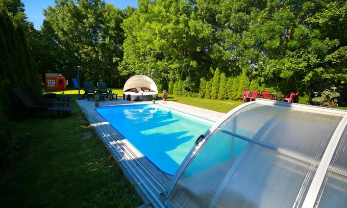 Lednice Apartment | Discover Astoria Lednice: Family-Friendly with Pool & Ocean Views