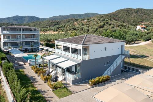 Sarti Apartment | Elegant Oceanfront Suites at Astra Sarti - Rated 9.4/10