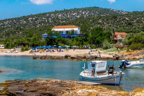 Astris Apartment | Relax at Astris Beach: Oceanfront Views and Family Fun