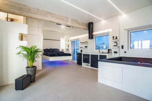 Metaxourgio Apartment | Discover Athenian Noir Blanc Penthouse with City Views