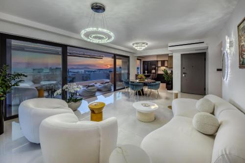 Elliniko-Argyroupoli Apartment | Experience the Athens Riviera Penthouse: 4-Star Family Retreat