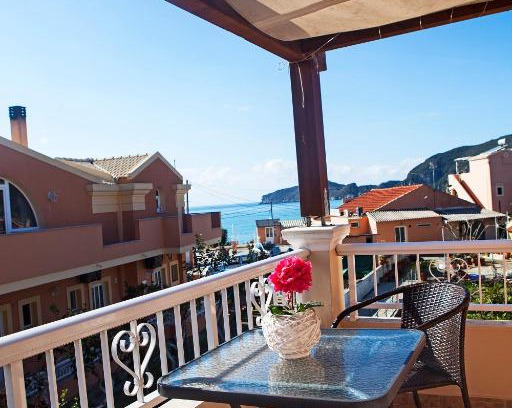 Agios Georgios Pagon Apartment | Idyllic Athina Studios with Oceanfront Views and Breakfast