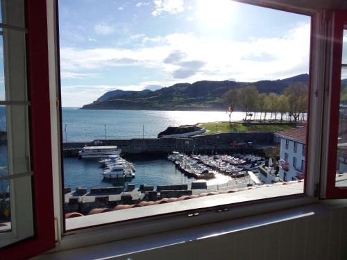 Mundaka Apartment | Family-Friendly Getaway at ATICO TORRONTERO - Rated 8.9/10