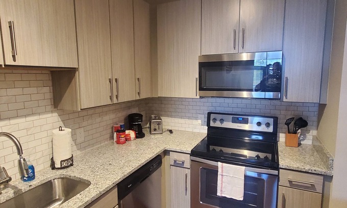 Atlantic Station Area Apartment | Discover Atlantic Station's Hidden Gem with Pool & Kitchen