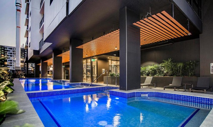 South Brisbane Apartment | Oceanfront Atlas Apartments by CLLIX with Hot Tub & Pool