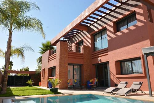 Tassoultante Villa | Elegant Atlas Royale Marrakech with Oceanfront Views