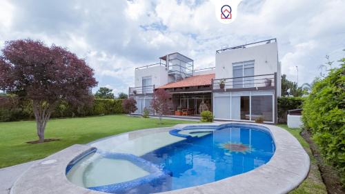 Atlixco House | Discover Atlixco House: Pool, Garden & Rooftop Retreat