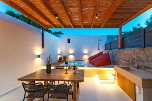 Kattavia Villa | Experience Atria: Rated 10/10 with Hot Tub & Family Dining