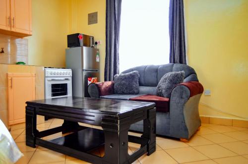 Mbotela Apartment | Comfortable Stay at Attic Place South B with Breakfast