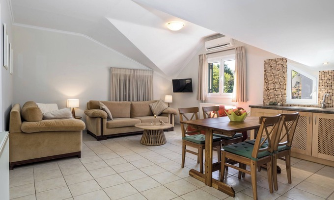 Argostoli Town Apartment | Central Attic Retreat with Breakfast and Family Amenities