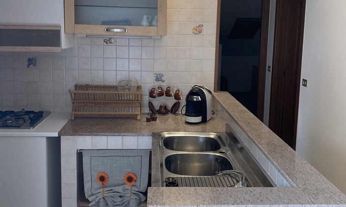 Pavana Apartment | Cozy Attic with Terrace – Family-Friendly Getaway