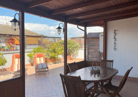 Quartiere XXXIII Lido di Ostia Ponente Apartment | Oceanfront Retreat: Attico con terrazza, Rated 9.8/10
