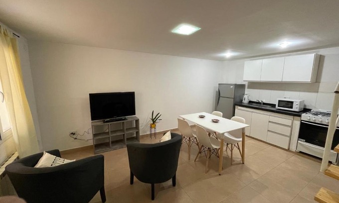 General Fernandez Oro Apartment | Inviting Aura: Guest Rated 9.1, Pet & Child Friendly