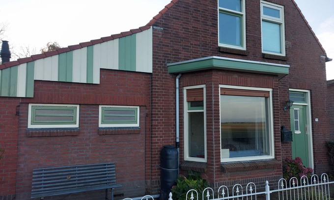 Nieuwvliet House | Charming Oceanfront Dike House in Nieuw Vliet, Rated 9.4