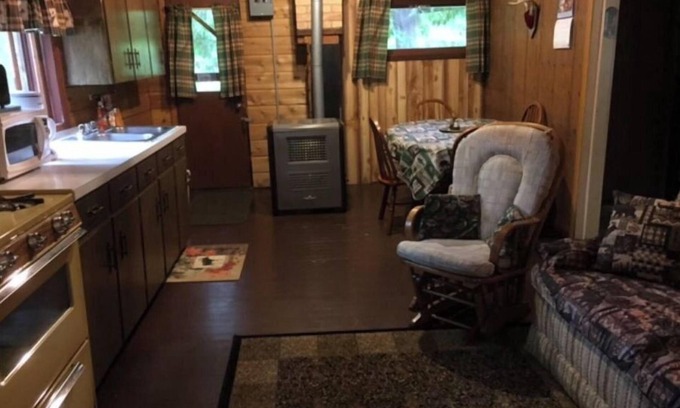 Northome Cabin | Authentic Log Cabin Retreat with Pet Friendly Amenities