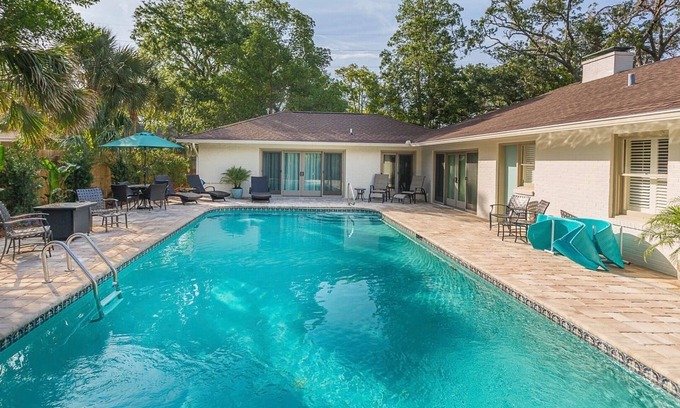 East Beach House | Inviting One-Level House with Expansive Pool & Ocean View