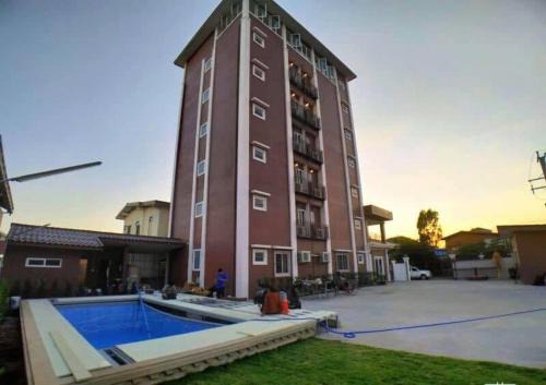 Savannakhet Hotel | Cozy Avalon Residence: Family-Friendly with Pool & Breakfast