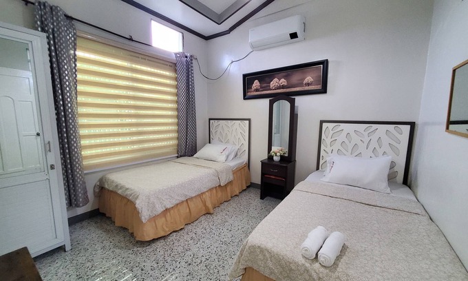 Tayug House | Discover AVE Homes: Family-Friendly 2-Bedroom Retreat