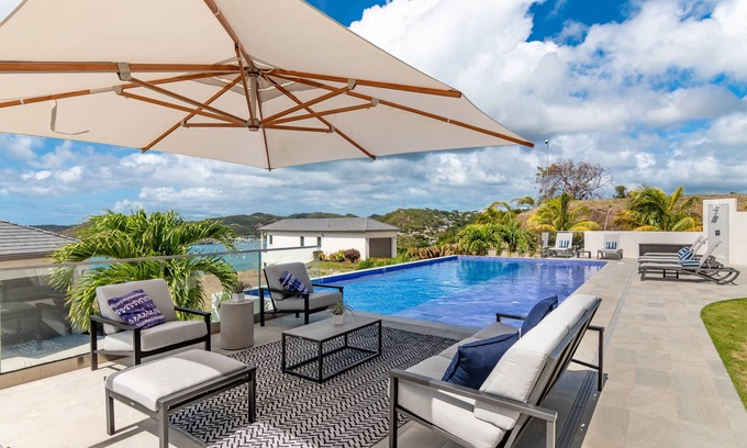 Calvigny Condo | Island Escape: Aventurine 2-Bedroom Suite with Ocean Views