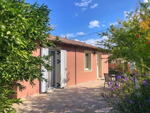 Sami Villa | Charming Avli Cottage: Family-Friendly Getaway Awaits