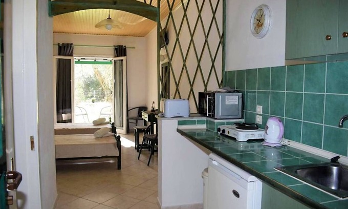 Kavos Apartment | Discover Avonlea Garden Studio A2 with Oceanfront Amenities