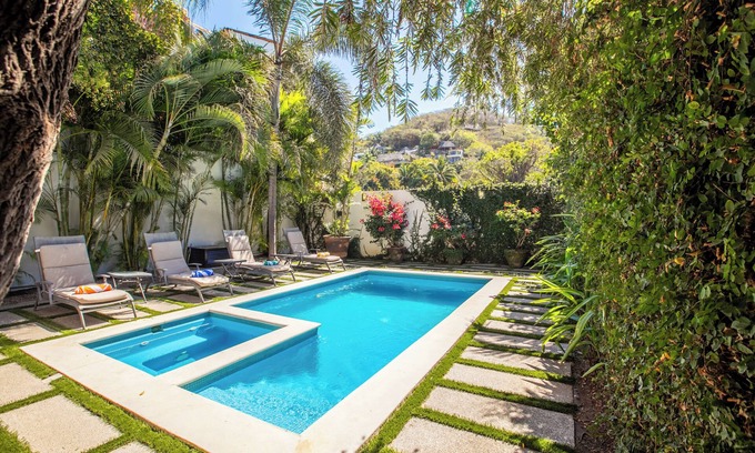 North End House | Award-Winning North End Villa with Ocean View & Hot Tub
