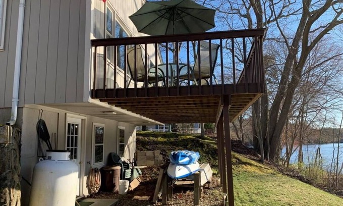 Coventry House | Lakefront Retreat: 2 BD House on Johnson’s Pond, Rated 9.8