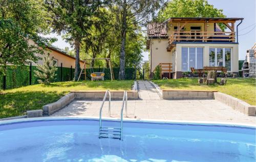 Aljmas House | Inviting Two-Bedroom Home with Pool in Aljmas