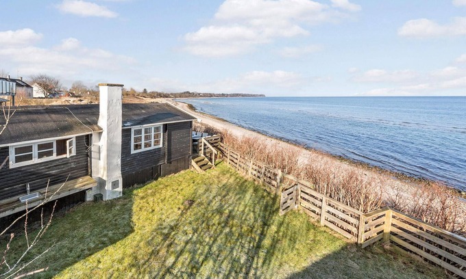 Dronningmolle House | Inviting Oceanfront Retreat with Panoramic Views