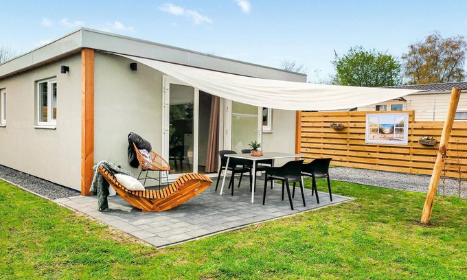 Heinkenszand House | Charming Cottage Retreat at Stelleplas with Spa & Lake View