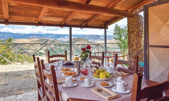 Nicosia House | Volcanic Stone Retreat with Lake Views and Spa Amenities