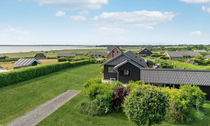 Ronbjerg House | Experience Breathtaking Lake Views from the Cozy Terrace