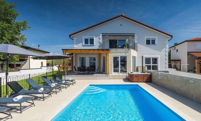 Kastelir-Labinci House | Villa Antonela: Timeless Design with Pool and Spa Amenities