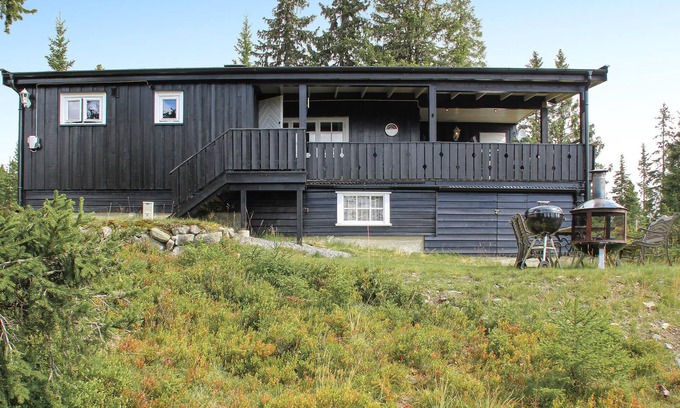 Sjusjoen House | Marvel at Breathtaking Nature Views and Top-Rated Amenities