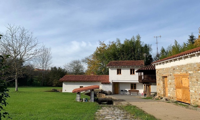 Distrito Rural Este House | Ideal Getaway with Water Mill and Expansive Lawn