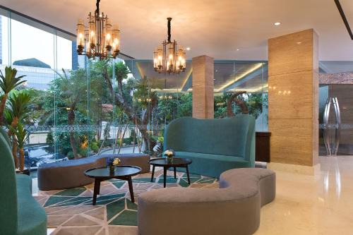 Kuningan Hotel | Discover Ayaka Suites: Family-Friendly with Pool & Breakfast
