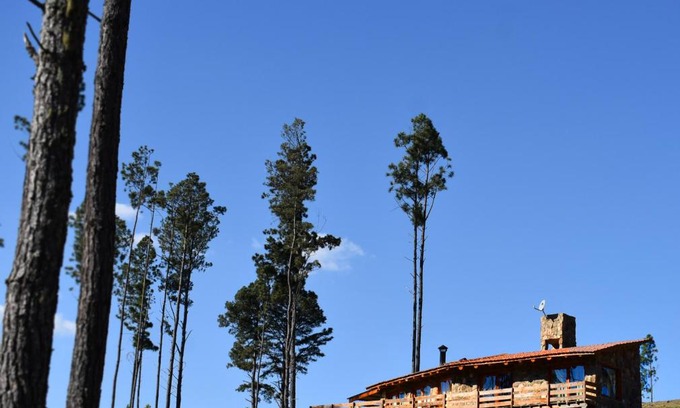 Intiyaco Ski Chalet | Discover Ayllupelli: Oceanfront Retreat with Pool & Beach