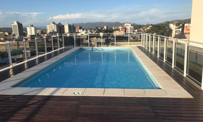 Villa Carlos Paz Apartment | Ayres de Las Sierras: Family-Friendly Stay with Pool