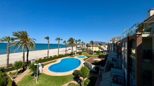 Almadrava Beach Apartment | Beachfront Escape at AZUL MARINO VYB with Pool & Ocean Views
