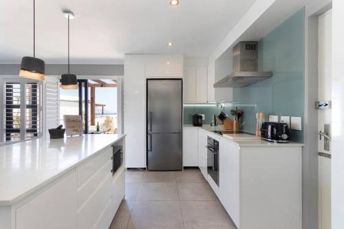 Big Bay Apartment | Stylish Azure 220 APT with Pool and Ocean View