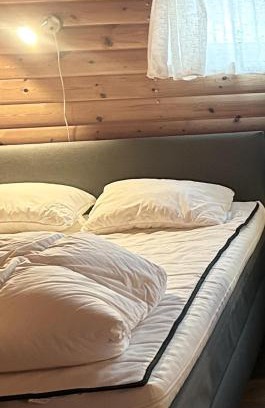 Stoten House | Cozy Bäckstugan: Child-Friendly Retreat for Your Getaway