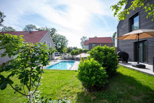 Buchelberg Ski Chalet | Relax at Büchelbergerei - Chaletdorf with Spa & Pool Access
