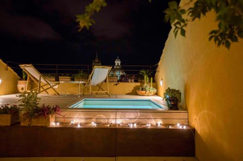 Caltagirone Bed & Breakfast | Perfect Getaway at B&B Attico Taranto with Hot Tub & Dining